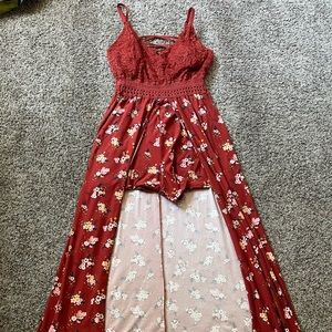 Orange patterned romper with train, cami top with lace on the outside